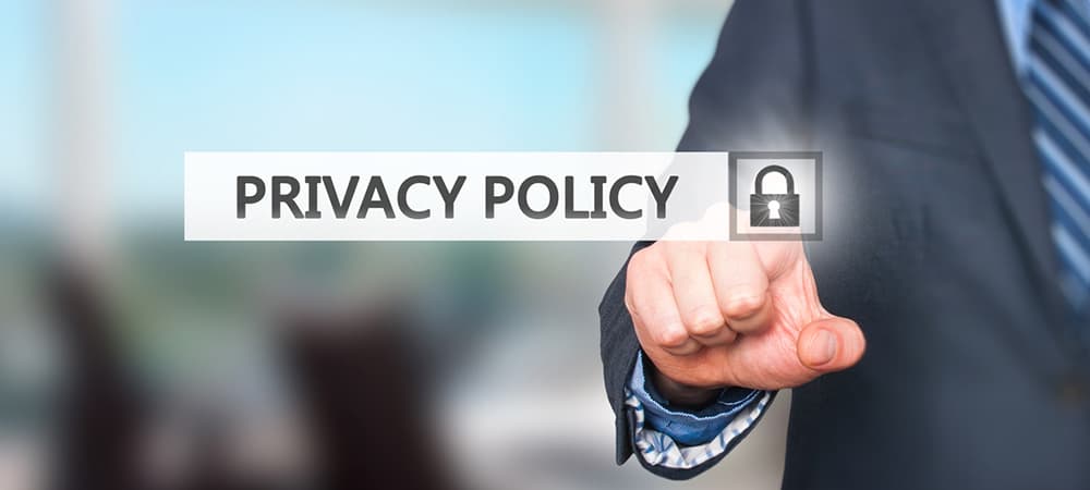 Businessman pressing Privacy Policy button on virtual screens. Padlock Icon. Isolated on office. Business, security, technology, internet and networking concept - Stock Image